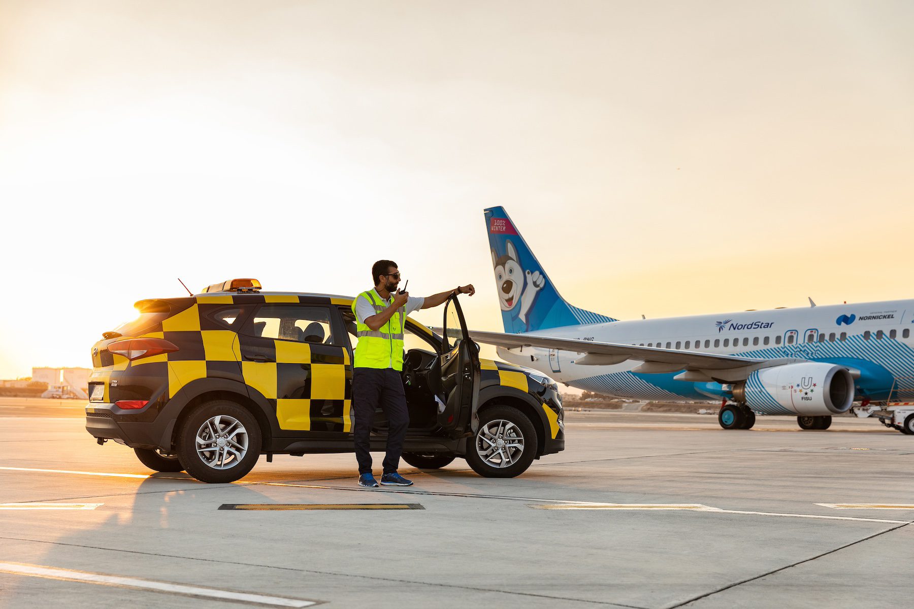 Emergency Worker on runway with plane