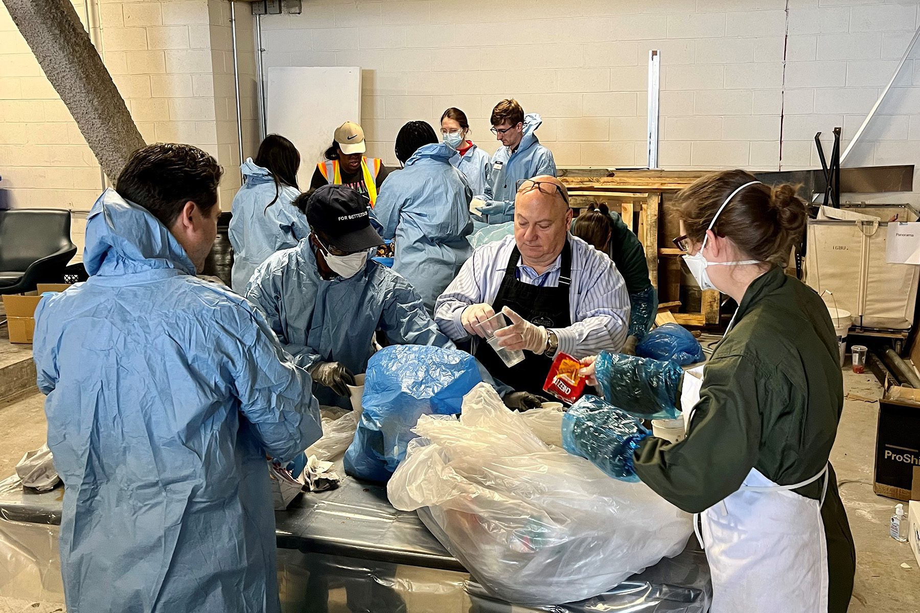 Group of people sorting waste